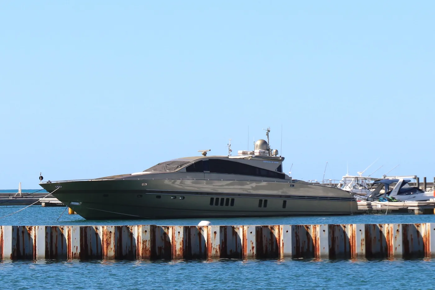 Motor yacht moored beside a dock in Marigot Bay, Saint Martin